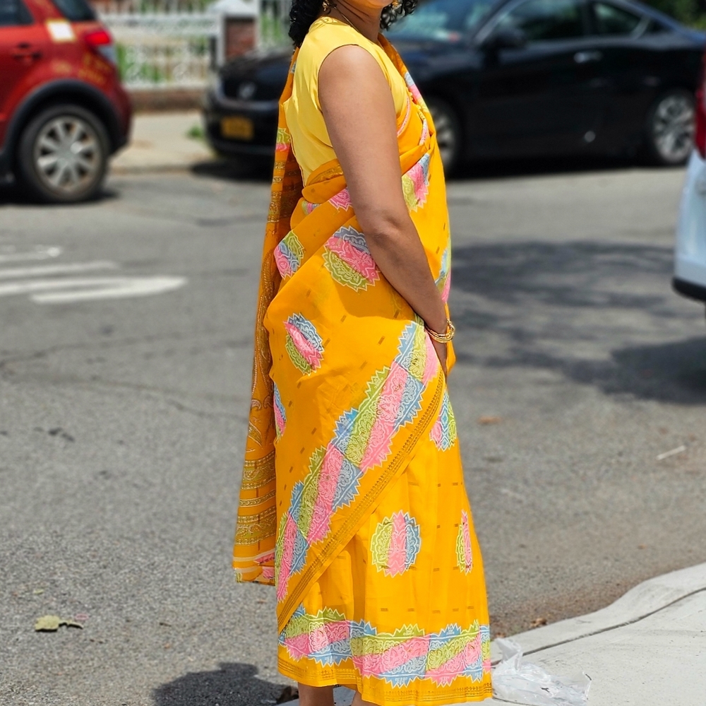 Women's yellow saree.